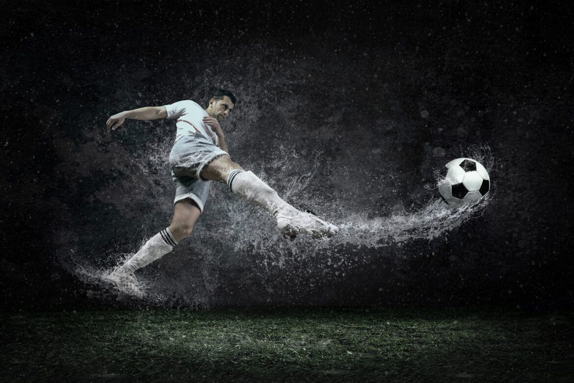 jogador-chutando-a-bola-campo-molhado-betssonbr